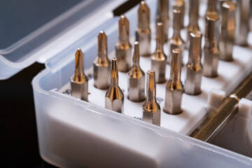 Screwdrivers for repair.
Set of screwdriver bits. Metal bits for screwdrivers. Tool kit Bits and...
