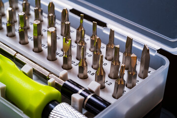 Screwdrivers for repair.
Set of screwdriver bits. Metal bits for screwdrivers. Tool kit Bits and adapters for screwdrivers. - obrazy, fototapety, plakaty