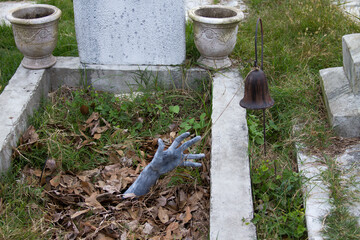 Spooky cemetery with death bell.