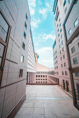 View of the building and the sky from the wide window.