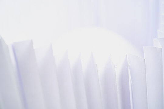 Zig Zag Folded paper with white orb glowing high key