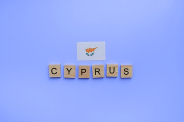 October 1, Independence Day in Cyprus, flag of Cyprus, minimalistic banner with the inscription in wooden letters