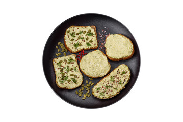 Grilled toast with avocado paste, eggs, cream cheese, salt, spices and herbs