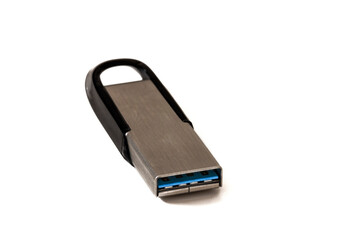 A pen drive isolated on a white background. An elegant portable storage solution: the pen drive,...