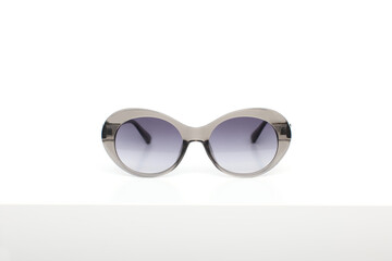  Fashionable sunglasses close up with white background
