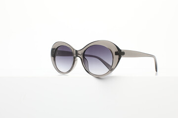  Fashionable sunglasses close up with white background
