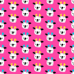 Cute pattern with the face of a deer. Vector seamless pattern with kawaii reindeer head on pink background. Christmas print for packaging