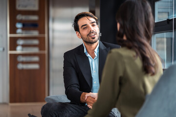 Male mature caucasian ceo businessman leader with diverse coworkers team executive managers group meeting. Multicultural professional businesspeople working together on research plan boardroom.