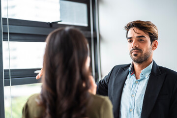 Male mature caucasian ceo businessman leader with diverse coworkers team executive managers group meeting. Multicultural professional businesspeople working together on research plan boardroom.