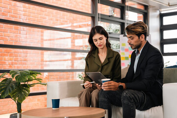 Male mature caucasian ceo businessman leader with diverse coworkers team executive managers group meeting. Multicultural professional businesspeople working together on research plan boardroom.