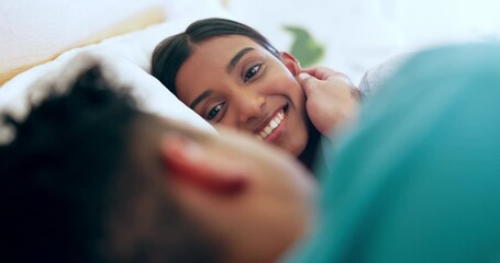 People in bed together, pillow talk and love with communication, couple relax and happy with trust and support. Commitment, partner and healthy relationship, woman and man with story and smile