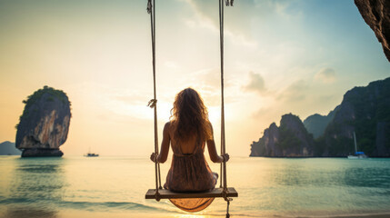 Traveler woman relaxing on swing above Andaman sea Railay beach Krabi, Leisure tourist travel Phuket Thailand summer holiday vacation trip, Beautiful destinations place Asia - Powered by Adobe