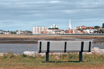 City of Rimouski seen from the park at the mouth of the river, at low tide in Rimouski. Bas-St-Laurent, Quebec, Canada