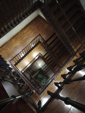 view of interior historic wooden staircase