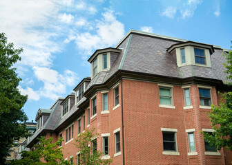 Newly built residential building designed in an old-style with a mansard roof, Boston, MA, USA