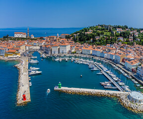 A panorama aerial view from the harbour entrance in the town of Piran, Slovenia in summertime