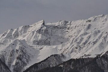 Russia. North-Eastern Caucasus. The inaccessible slopes of the eternally snow-covered high-altitude...