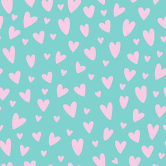 Hand drawn doodle hearts on a background seamless pattern. Valentine`s day theme.Vector illustration.