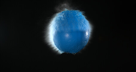 Shot Breaking Water Filled blue Balloon