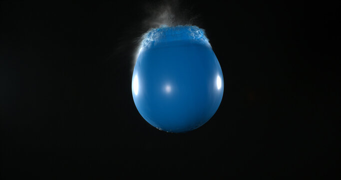 Shot Breaking Water Filled blue Balloon