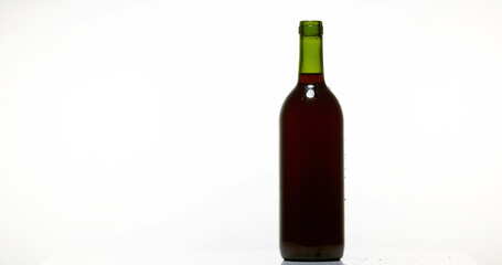 Bottle of Red Wine against White Background