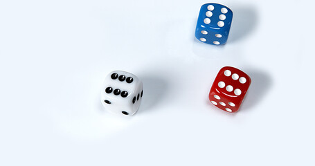Dice rolling against White background