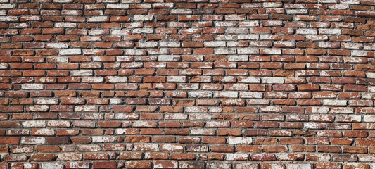 Wall of old red brick, background pattern.