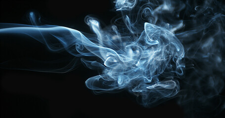 Smoke of Cigarette rising against Black Background