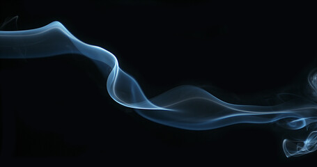 Smoke of Cigarette rising against Black Background