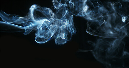 Smoke of Cigarette rising against Black Background