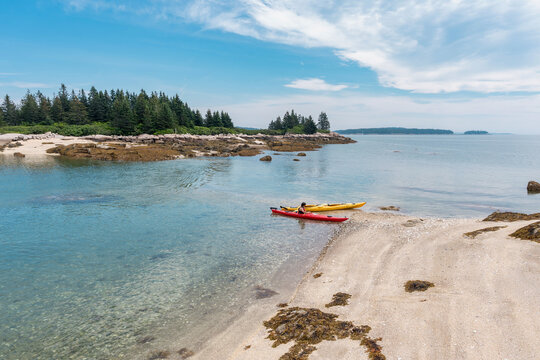 kayaks beached on an island in Stonington, Maine