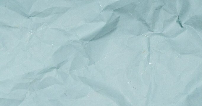 Sky blue crumpled paper texture. Stop Motion. Seamless Looped. Grunge Paper Texture Noise Animated Stop Motion Background and Overlays.