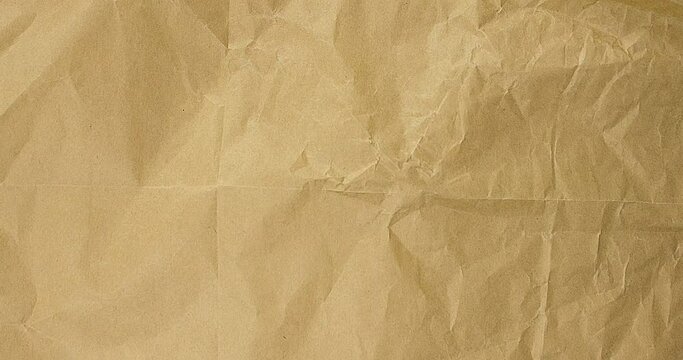 browncrumpled paper texture. Stop Motion. Seamless Looped. Grunge Paper Texture Noise Animated Stop Motion Background and Overlays.