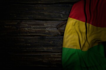 pretty independence day flag 3d illustration. - dark photo of Mali flag with large folds on old wood with free place for your text