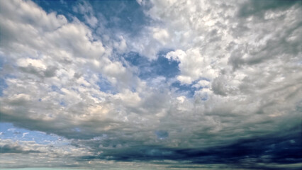 cute large bright clouds in the blue sky background - photo of nature