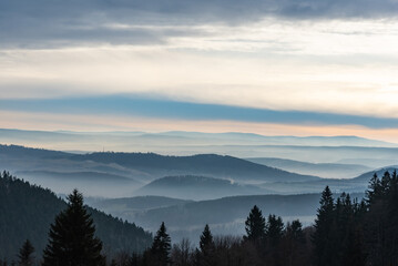 Soft fog in the mountains during sunset