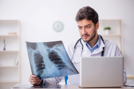 Young male doctor radiologist working in the clinic