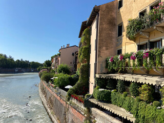 River in front of italian houses in Verona