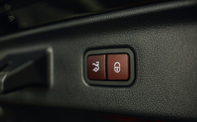 Close-up of the trunk release button. modern car interior. Automatically opening and closing the...