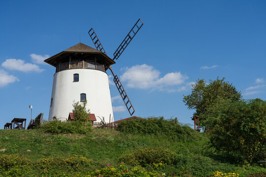 Old windmill in the background of blue sky
