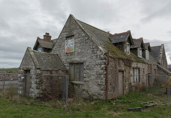Fototapeta na wymiar Old derelict scottish house fenced off