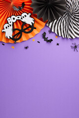 Wishing you a hauntingly good time at Halloween party. Top view vertical flat lay of folding paper...