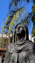 Fototapeta na wymiar Statue of the Virgin Mary in the San Pedro cemetery in Medellin, Colombia