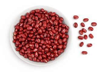 Red adzuki beans in ceramic bowl isolated on white background. Top view. Flat lay.