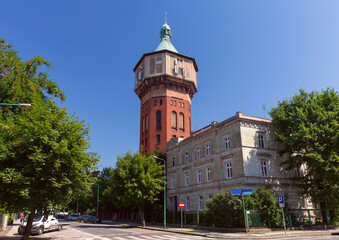 Fototapeta na wymiar Old brick water tower in Swidnica on a sunny day.