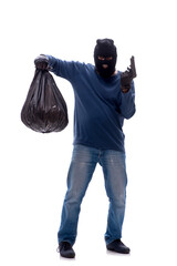 Young male burglar stealing money isolated on white