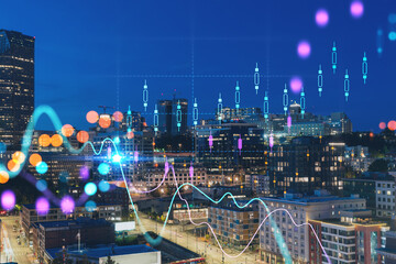 Illuminated aerial cityscape of Seattle, downtown at night time, Washington, USA. Forex graph hologram. The concept of internet trading, brokerage and fundamental analysis