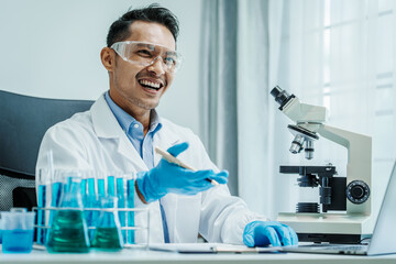 Asian male scientists white coat conducting research investigations medical laboratory, lab...