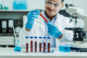 Fototapeta premium Asian male scientists white coat conducting research investigations medical laboratory, lab bacteria, microbiology laboratory public health, animal health, Aerobes, anaerobes, mycobacteria and fungi