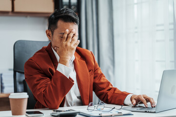 Asian Indian male market researchers specialize in collecting initiative analyst, monitor marketing activities, analyze published data, statistics, evaluate past performance of product, service sales